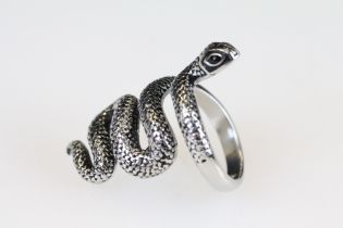 A ladies dress ring in the form of a snake set with black stone eyes. Marked 925