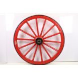 Shand, Mason & Co of London - A large red painted spoked wooden & cast iron cart wheel