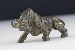 An ornamental Chinese Bronze bull figure.