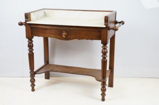 19th Century Victorian marble topped wash stand. The galleried marble top with drawer beneath,