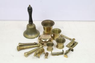 Collection of assorted brass to include pig figurines, bell, paper holder, pestle and mortars etc. 1