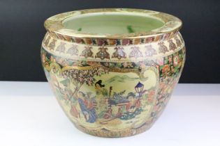 Oriental ceramic fish bowl planter decorated with figural panels, enamel beading, and koi carp