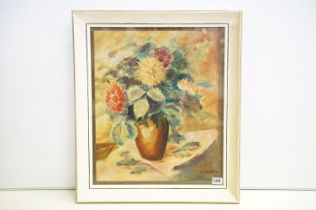 1949 A Cassiman framed still life oil on canvas study of Flowering Blooms and Fauna in a ceramic