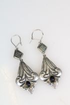A pair of ladies 925 sterling silver drop earrings, in the art nouveau style each set with central