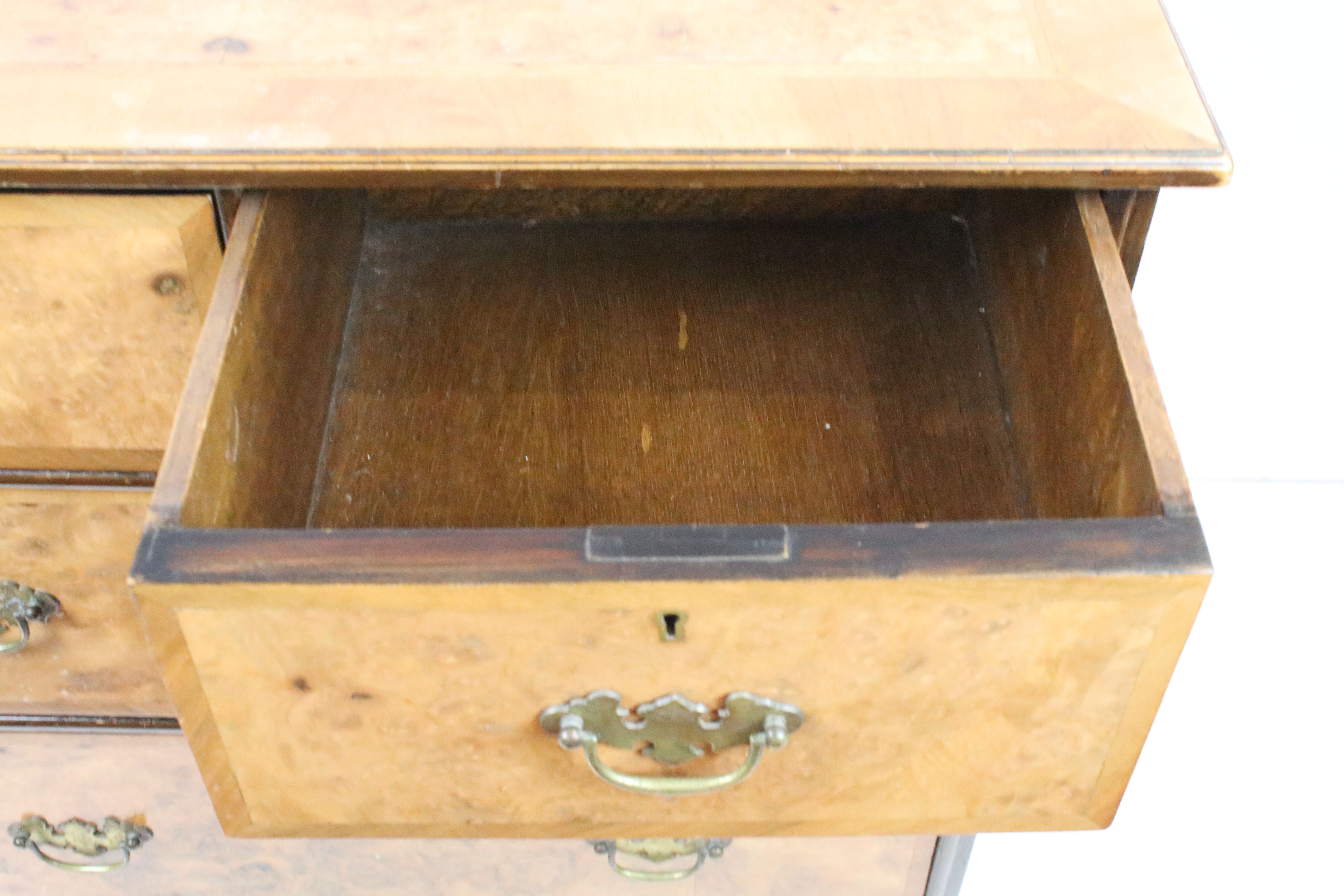 20th Century walnut veneered chest of drawers having two over two drawers with brass swing handles - Image 6 of 8