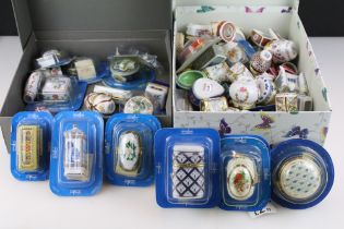 Collection of Del Prado miniature porcelain trinket boxes, some in card bubble packaging. (2)