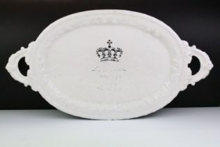 French white glazed ceramic serving platter of oval form, with crown to centre, inscribed 'Paris',