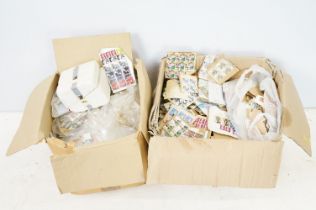 Two boxes of world kilo ware stamps.