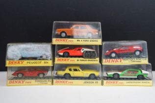 Seven boxed / cased Dinky diecast models to include 1415 Peugeot 504 in blue, 164 Mk4 Ford Zodiac in