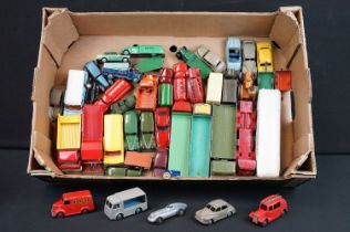 42 Mid 20th C play worn Dinky diecast models to include commercial, farming and road examples