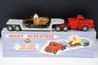 Boxed Dinky Supertoys 986 Mighty Antar Low Loader With Propeller with red cab and figure and grey