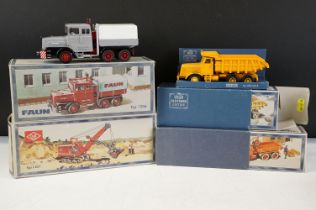 Four boxed NZG construction diecast models to include No. 440 O&K Typ L651 crane in red, No. 409