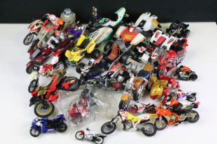 Group of various plastic model motorcycles and quad bikes of various scales