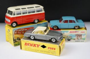 Three boxed French Dinky diecast models to include 541 in two-tone pale cream and red body with grey