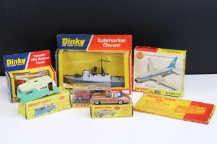 Seven boxed Dinky diecast models to include 717 Boeing 737, 188 Four Berth Caravan in green and