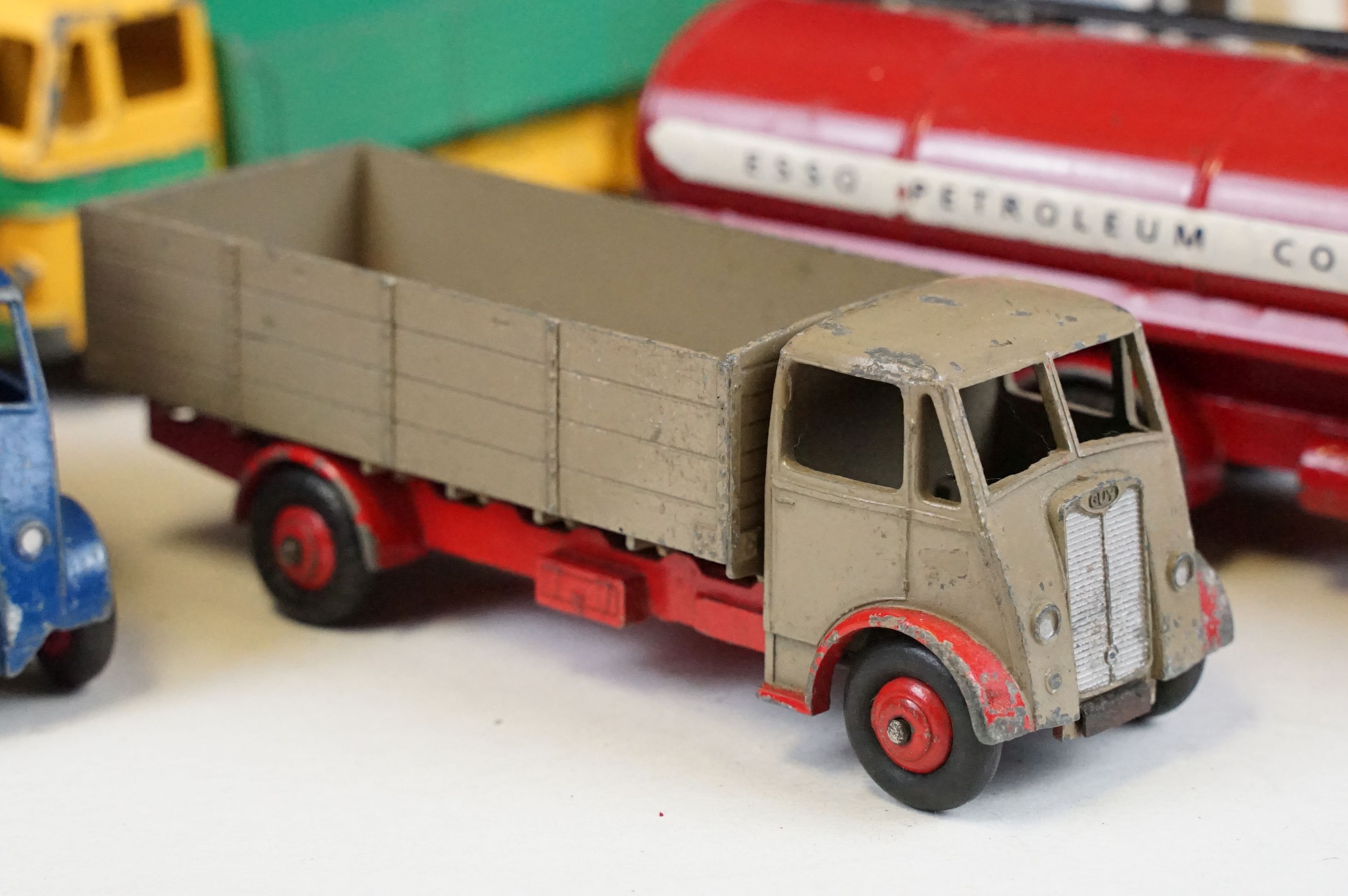 12 Mid 20th C Dinky diecast models to include Foden Fuel Tanker in Two-Tone light blue and dark blue - Image 3 of 9