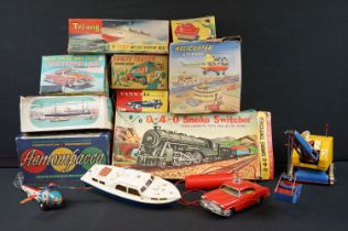 Collection of 14 boxed & unboxed Mid 20th C tin plate & plastic models and toys to include boxed