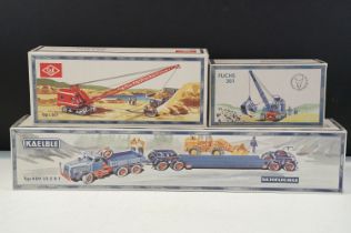 Three boxed 1/50 scale NZG construction diecast models to include O&K Typ L651 crane in red, Fuchs