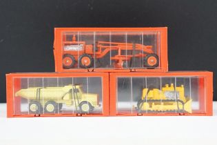 Three cased / garage box Mini Dinky diecast models to include 94 International Bulldozer, 97