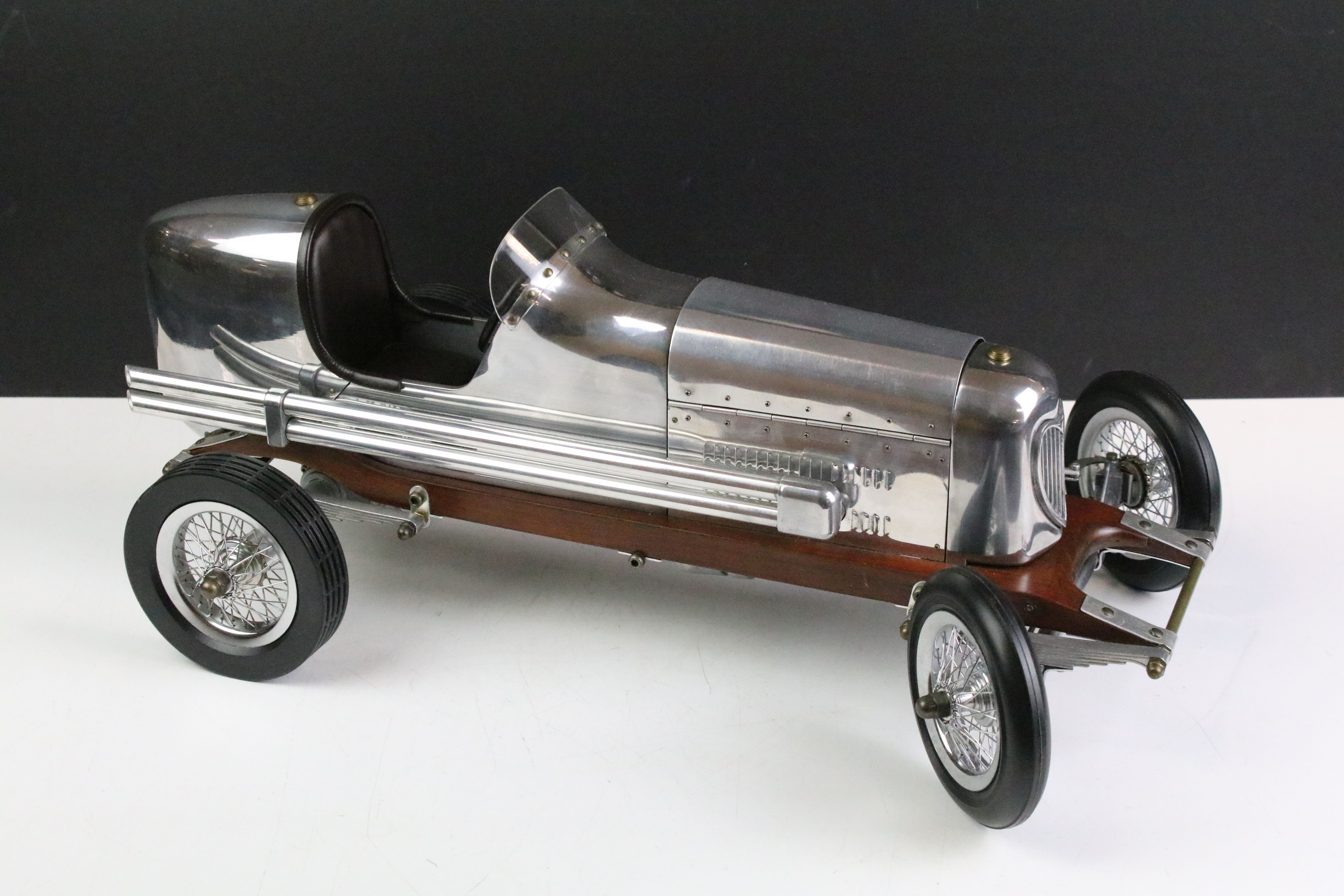 Mid to late 20th C scratch built metal and wooden model racing car, the body in aluminum with