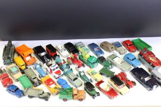 Around 40 Mid 20th C play worn diecast models, mainly Dinky examples