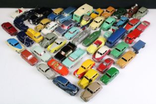 50 Mid 20th C play worn Dinky diecast models to include Morris Oxford in two tone red & white, 436