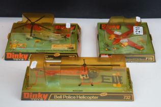 Three boxed Dinky diecast models to include 732 Bell Police Helicopter, 715 Beechcraft C55 Baron and