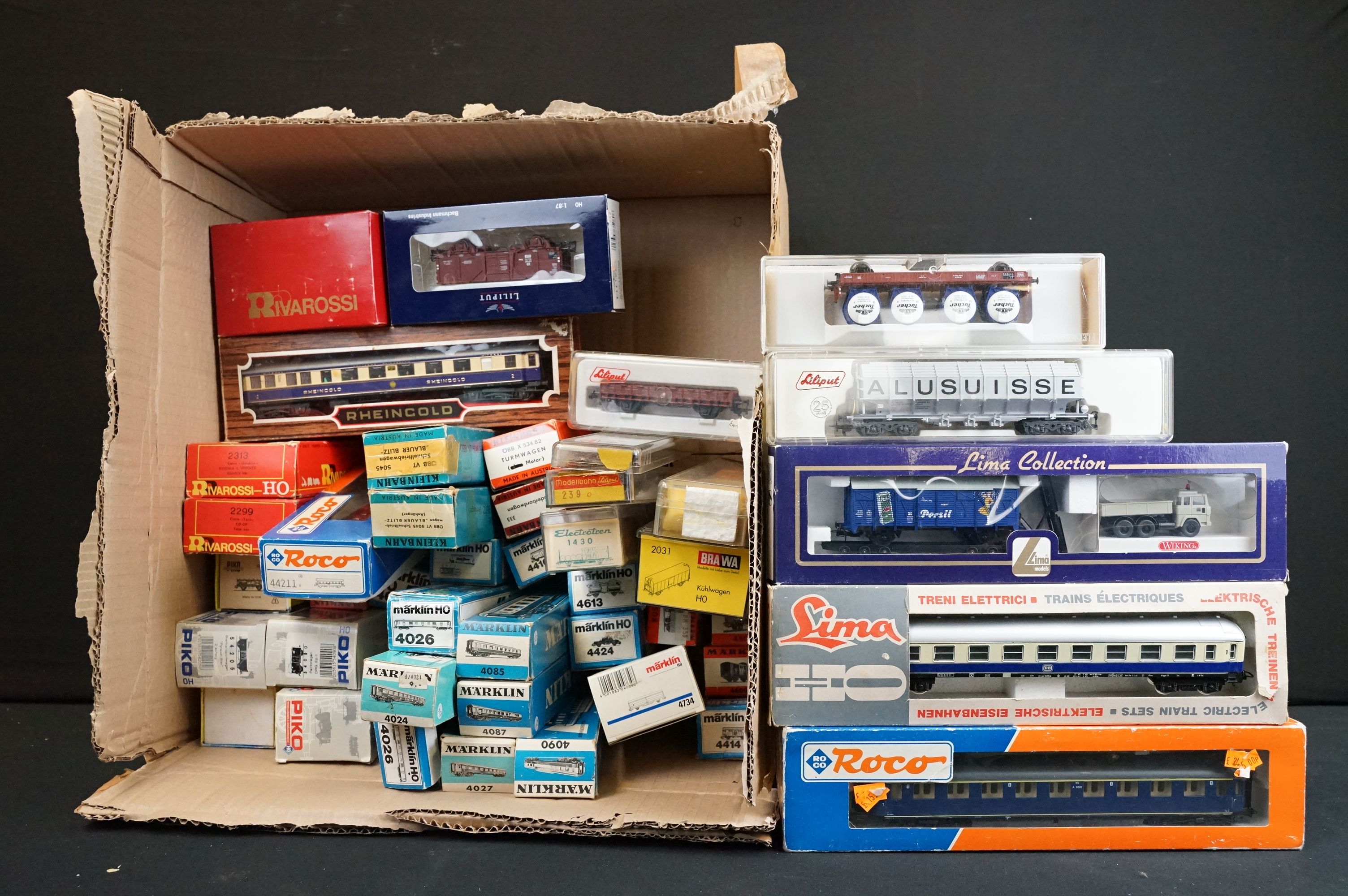 Around 40 boxed HO gauge items of rolling stock to include Marklin, Piko, Roco, Liliput,