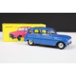 Boxed French Dinky 518 Renault 4L diecast model in dark blue with creamy white interior, silver