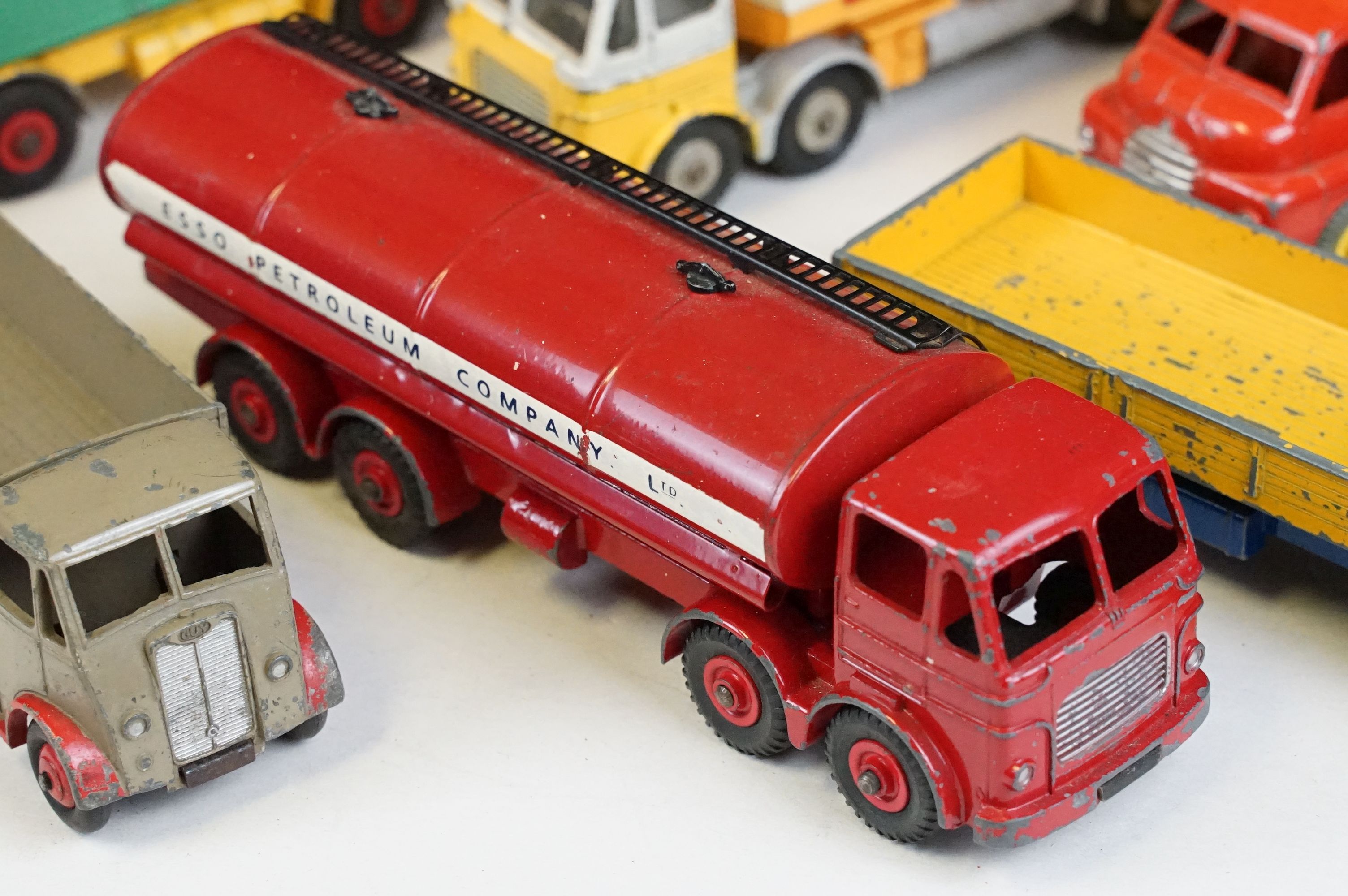 12 Mid 20th C Dinky diecast models to include Foden Fuel Tanker in Two-Tone light blue and dark blue - Image 4 of 9