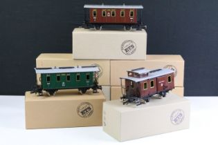 Seven boxed ETS O Gauge CSD Series items of rolling stock to include 301 green coach, 302 green
