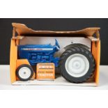 Boxed ERTL Ford 4000 Tractor diecast model in blue, complete with exhaust stack still sealed in