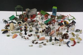 Collection of early-mid 20th C metal farm animals, figures and accessories to include Dinky,