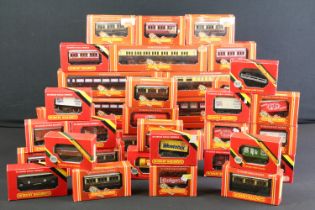 41 Boxed Hornby OO gauge items of rolling stock to include coaches, vans and wagons featuring R413