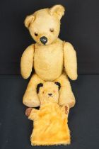 Early to mid 20th C straw filled teddy bear, articulated limbs, with growler, showing some wear