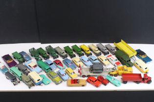 Over 40 Mid 20th C play worn Dinky diecast models to include commercial and road examples