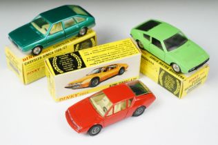Three boxed French Dinky diecast models to include 1411 Alpine Renault A310 in red with creamy white
