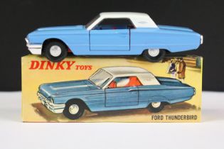 Boxed Hong Kong 57/005 Ford Thunderbird diecast model with blue body and white roof with red