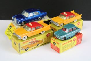 Four boxed Dinky diecast models to include 265 Plymouth USA Taxi, 134 Triumph Vitesse, 266