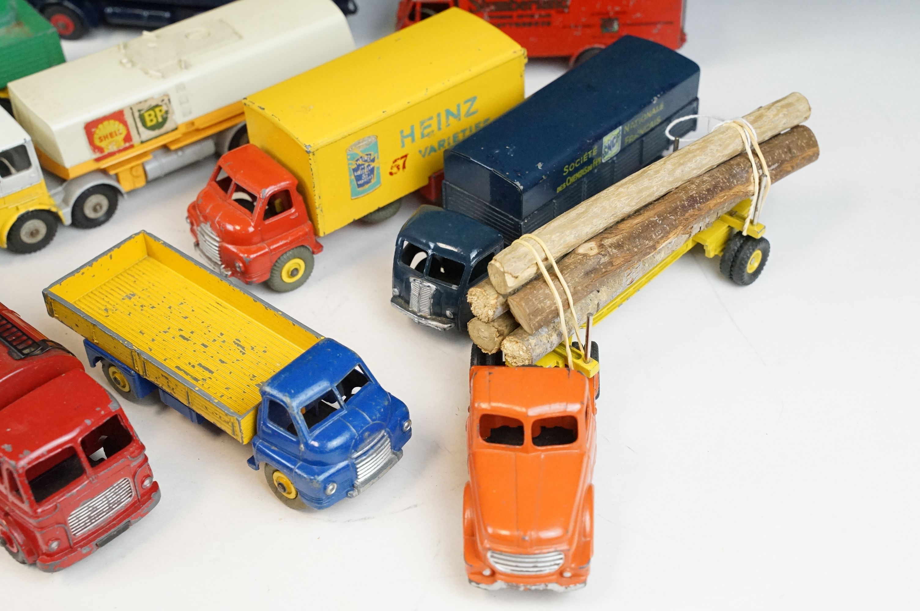 12 Mid 20th C Dinky diecast models to include Foden Fuel Tanker in Two-Tone light blue and dark blue - Image 5 of 9
