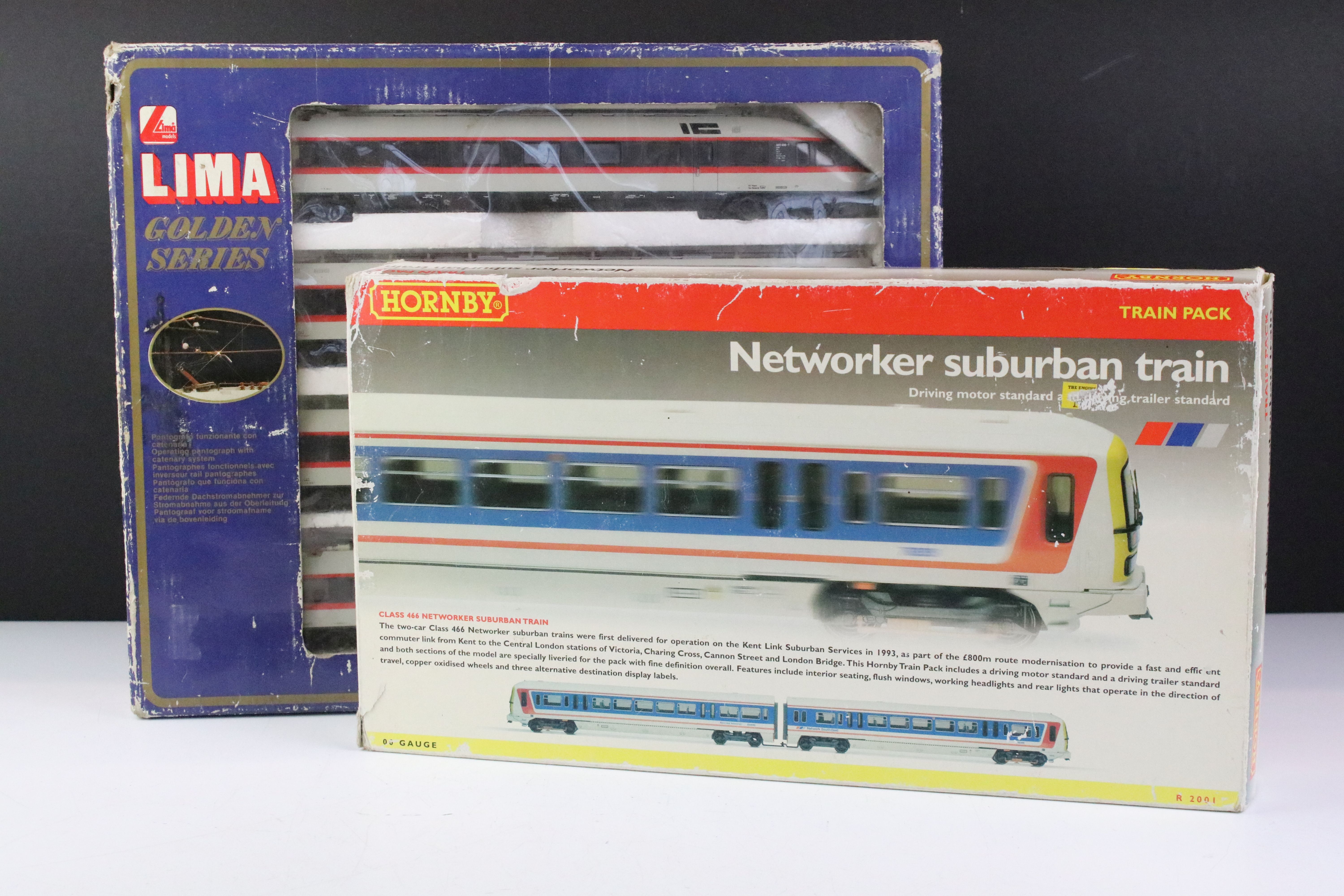 Two boxed OO gauge train packs to include Lima Golden Series 14 9742 GP and Hornby R2001 Networker
