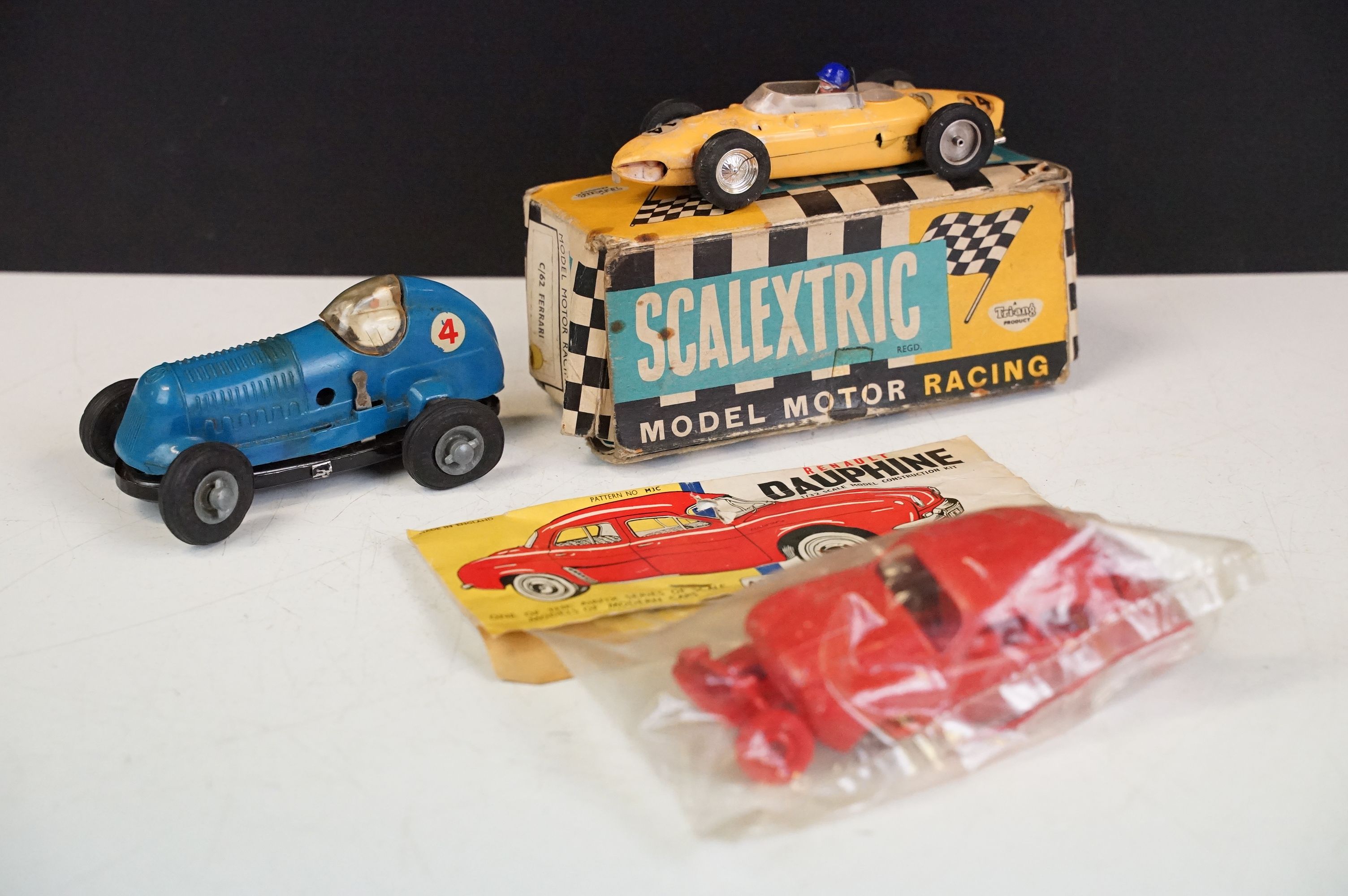 Three boxed / bagged / unboxed models to include boxed Triang Scalextric C62 Ferrari in yellow (In