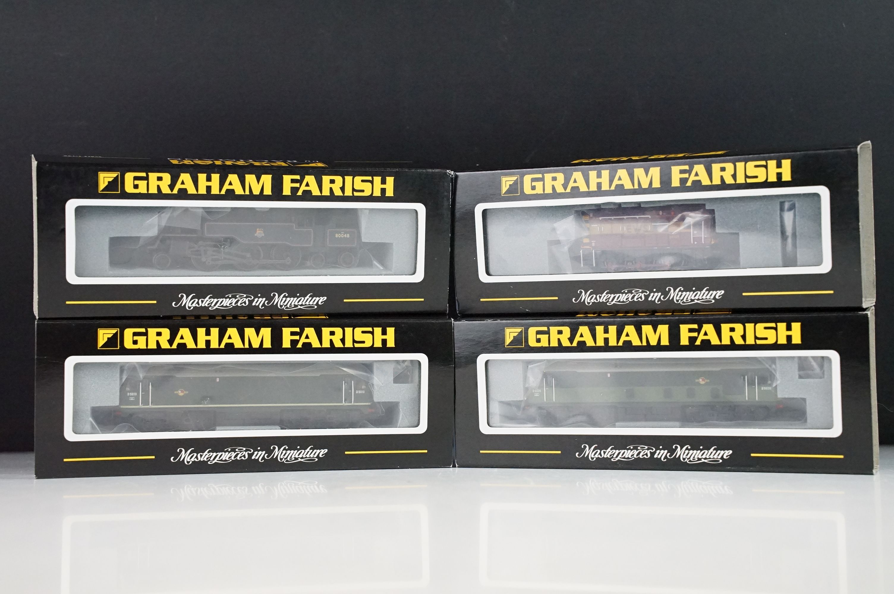 Four cased Graham Farish by Bachmann N gauge locomotives to include 372-977 Class 24 Diesel BR two