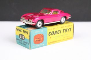 Boxed Corgi 310 Chevrolet Corvette Sting Ray diecast model in metallic cerise with yellow