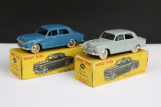 Two boxed French Dinky 24B Berline 403 Peugeot diecast models to include blue and grey colour