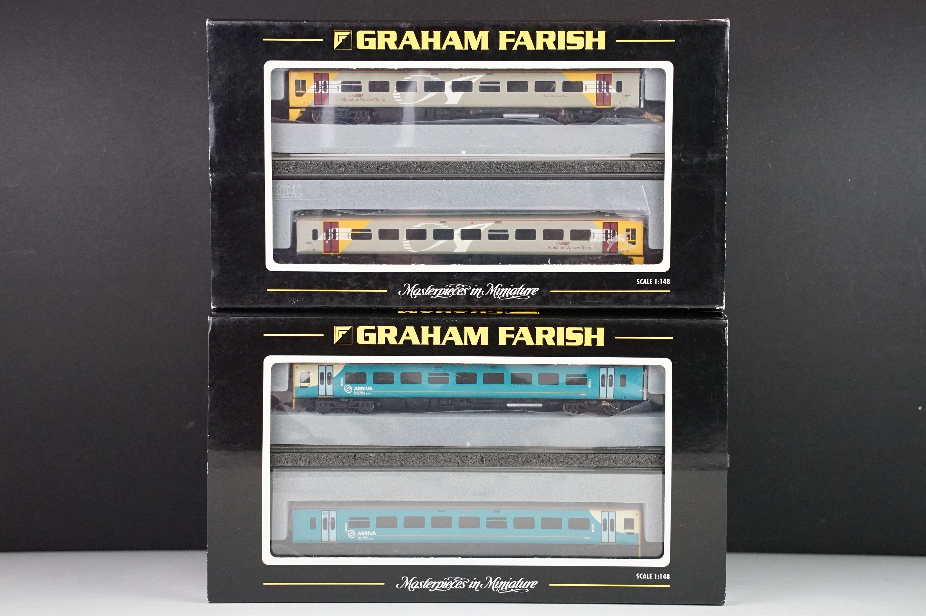 Two cased Graham Farish by Bachmann N gauge DMU sets to include 371-553 158 2 Car DMU Wessex Train