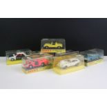Seven cased Dinky diecast models to include 210 Alfa Romeo 33 Tipo Le Mans with Speedwheels, 153