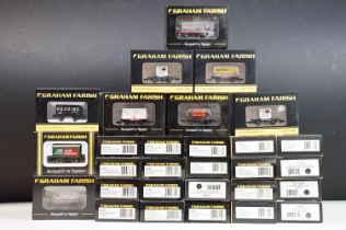 29 Boxed Graham Farish N gauge items of rolling stock featuring wagons and vans to include 377-