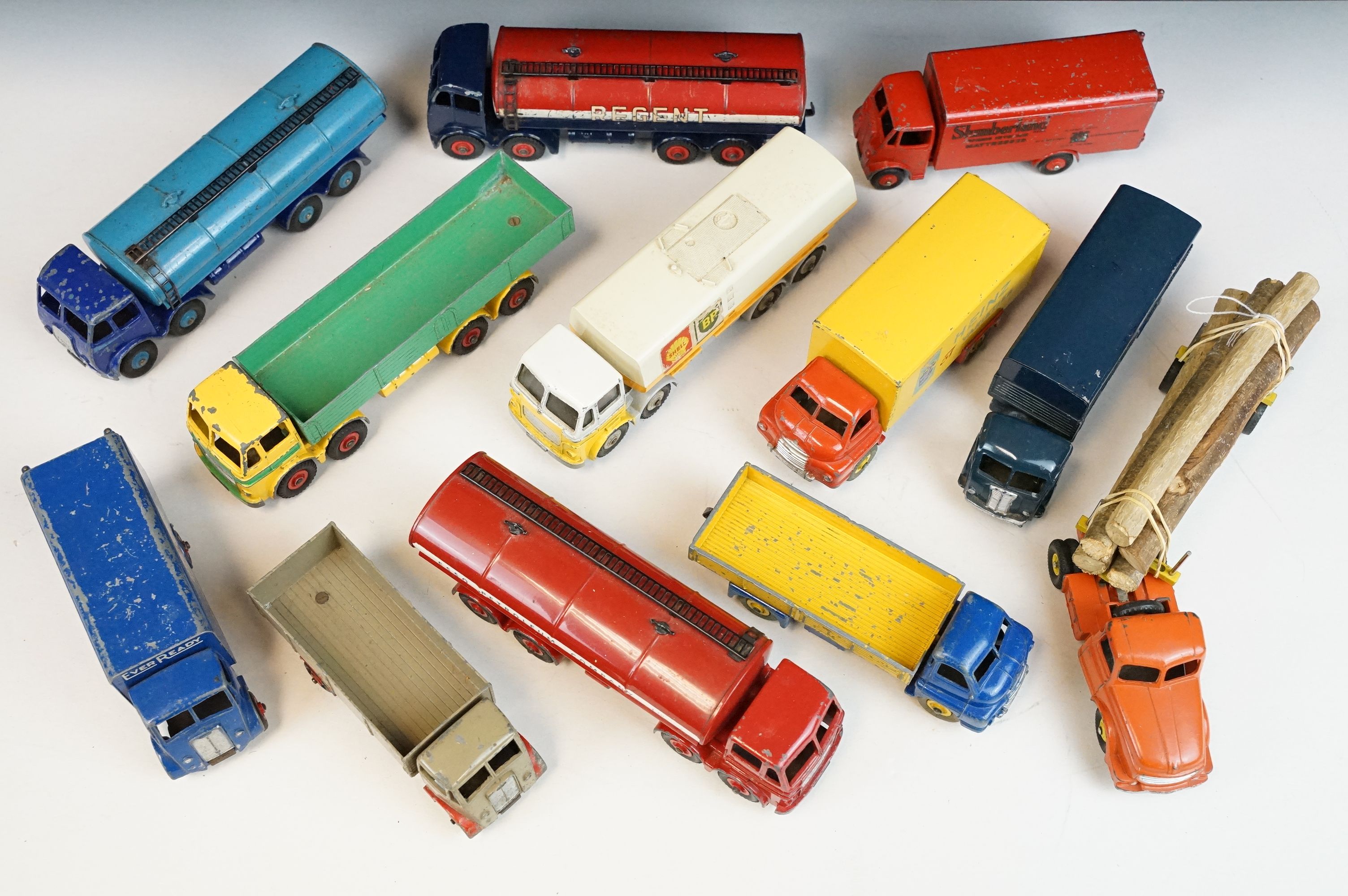 12 Mid 20th C Dinky diecast models to include Foden Fuel Tanker in Two-Tone light blue and dark blue