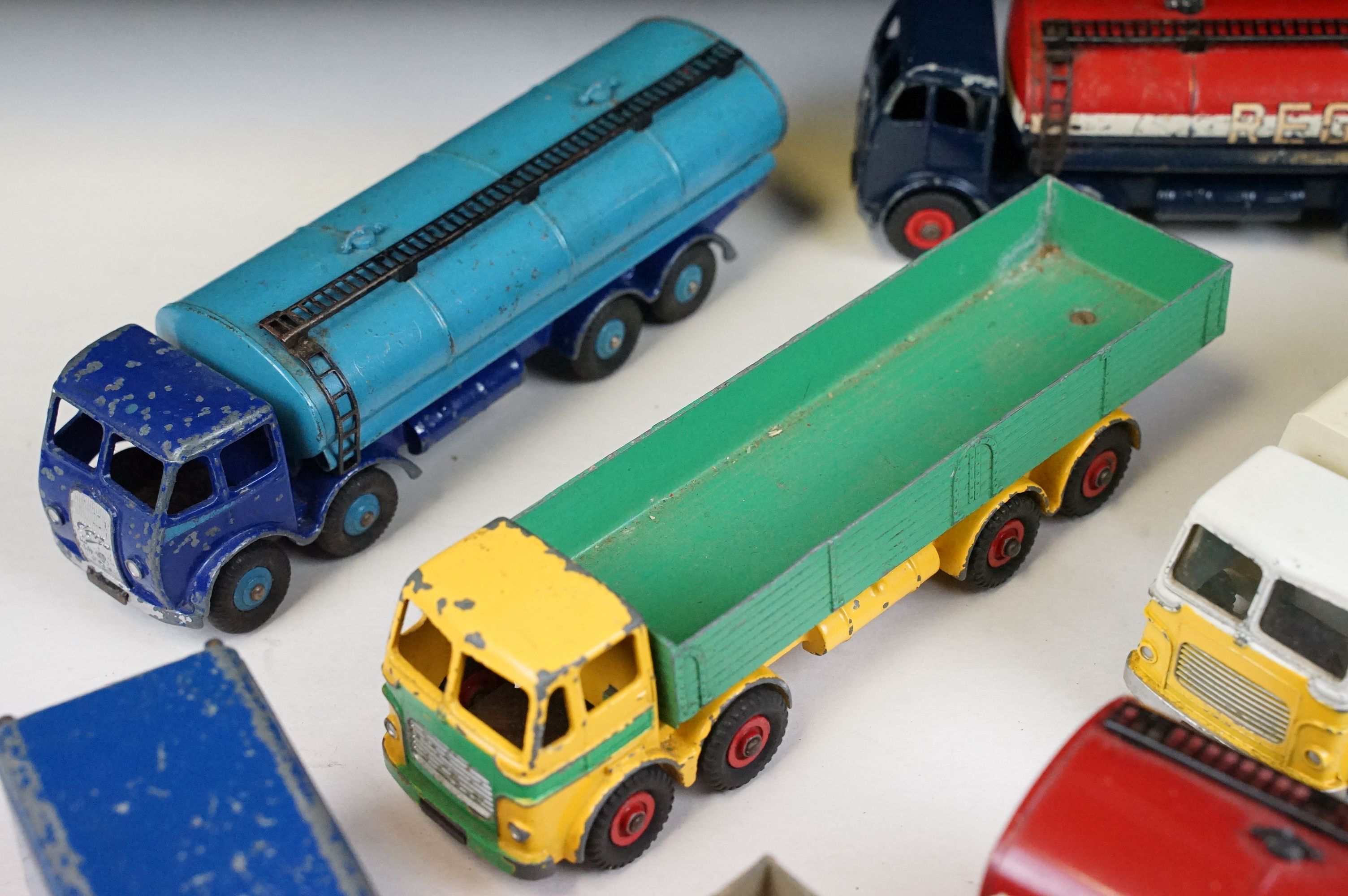 12 Mid 20th C Dinky diecast models to include Foden Fuel Tanker in Two-Tone light blue and dark blue - Image 7 of 9